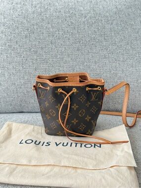 Authentic Louis Vuitton Monogram nano Mini Bucket Crossbody in Brown and Tan